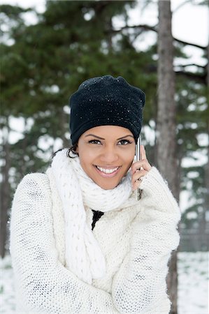 paris and winter - Woman on cell phone in snowy forest Stock Photo - Premium Royalty-Free, Code: 649-06716645