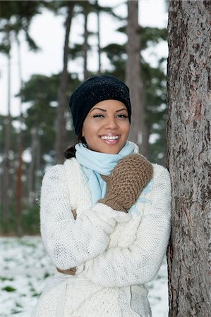 simsearch:649-06716651,k - Woman standing in snowy forest Stock Photo - Premium Royalty-Free, Code: 649-06716640