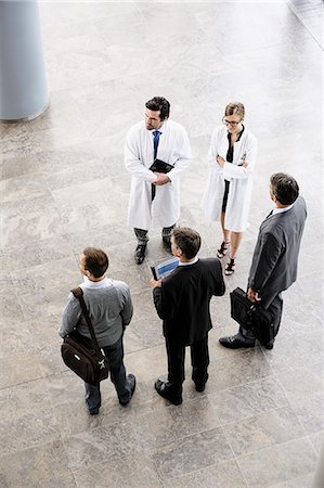 doctor and business man - Business people and doctors greeting Stock Photo - Premium Royalty-Free, Code: 649-06716703