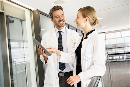 doctor business computer - Doctors using tablet computer Stock Photo - Premium Royalty-Free, Code: 649-06716743