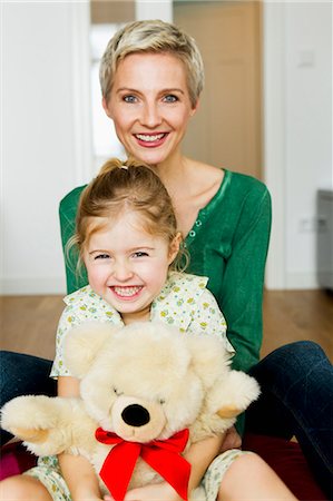 pictures of girls and teddy bears - Mother and daughter sitting on floor Stock Photo - Premium Royalty-Free, Code: 649-06716787