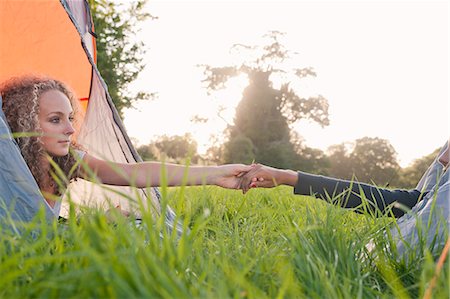 support (physical human) - Teenage girls holding hands at campsite Stock Photo - Premium Royalty-Free, Code: 649-06716841