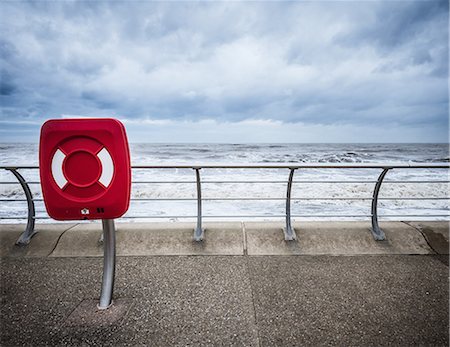 stormy beach - Red sign at beach wall Stock Photo - Premium Royalty-Free, Code: 649-06716908