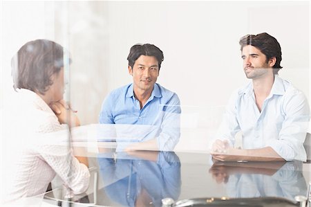 salle de réunion - Business people viewed through window Photographie de stock - Premium Libres de Droits, Code: 649-06717126