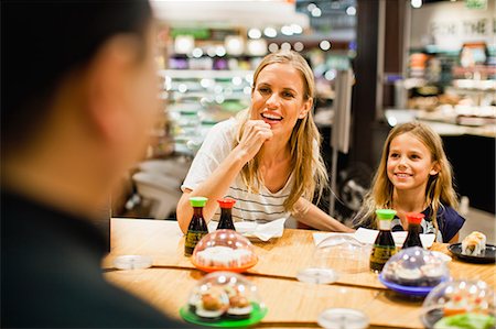 family eating table - Mother and daughter eating at deli Stock Photo - Premium Royalty-Free, Code: 649-06717213