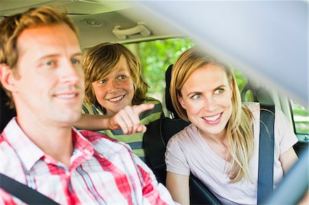 simsearch:6108-06907598,k - Family riding in car together Photographie de stock - Premium Libres de Droits, Code: 649-06717277