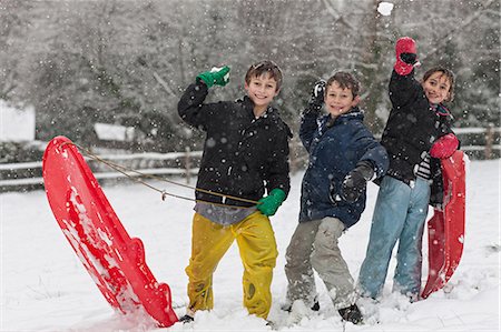 playing outdoor snow - Children having snowball fight Stock Photo - Premium Royalty-Free, Code: 649-06717357