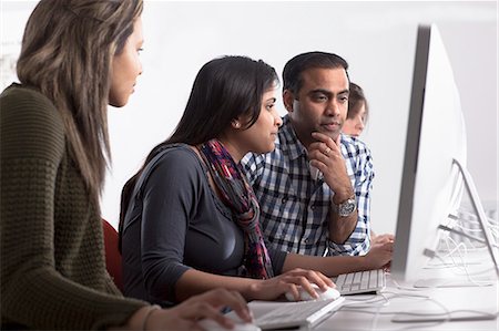 electronic school desk - People using computers at desk Stock Photo - Premium Royalty-Free, Code: 649-06717370