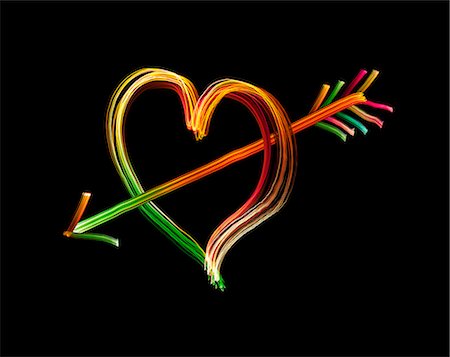 Light painting of heart with arrow Stock Photo - Premium Royalty-Free, Code: 649-06717422