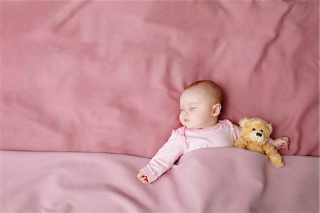 simsearch:6122-07698015,k - Baby girl sleeping in bed Stock Photo - Premium Royalty-Free, Code: 649-06717436