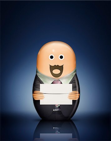Businessman Russian doll with envelope Stock Photo - Premium Royalty-Free, Code: 649-06717627