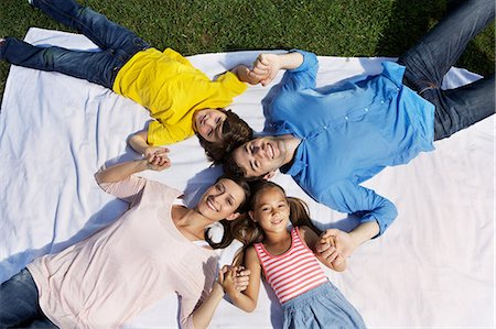 simsearch:649-06812439,k - Portrait of family with two children from overhead Stock Photo - Premium Royalty-Free, Code: 649-06812443