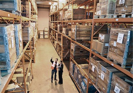 distribution - Worker and supervisor in warehouse Stock Photo - Premium Royalty-Free, Code: 649-06812501