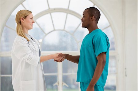 doctor handshake - Two doctors shaking hands Stock Photo - Premium Royalty-Free, Code: 649-06812584