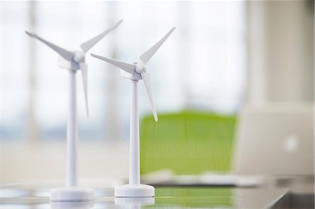 solution (mixture of substances) - Two models of wind turbines on desk Stock Photo - Premium Royalty-Free, Code: 649-06812609