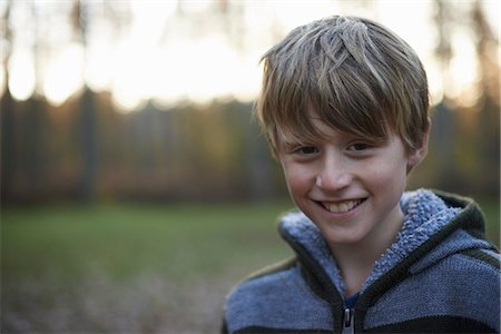 Portrait of boy in forest Stock Photo - Premium Royalty-Free, Code: 649-06812990