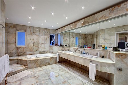 Marble tiled bathroom of luxury villa Stock Photo - Premium Royalty-Free, Code: 649-06829418