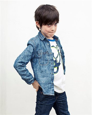 Portrait of boy against white background Stock Photo - Premium Royalty-Free, Code: 649-06829573