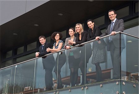 Six office colleagues on balcony Foto de stock - Sin royalties Premium, Código: 649-06829693