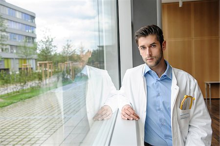Portrait of young male doctor Stock Photo - Premium Royalty-Free, Code: 649-06829841