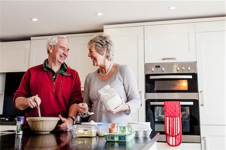 seniors baking - Senior couple baking together in kitchen Stock Photo - Premium Royalty-Free, Code: 649-06829937