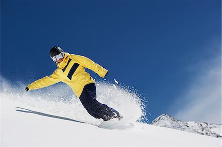 ski - Young woman snowboarding Stock Photo - Premium Royalty-Free, Code: 649-06844031