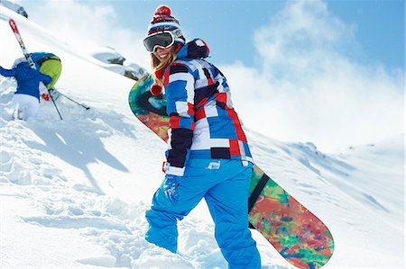 Female snowboarder in snow Foto de stock - Sin royalties Premium, Código: 649-06844056