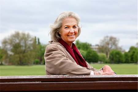 sitting on park bench - Senior woman sitting on park bench, portrait Stock Photo - Premium Royalty-Free, Code: 649-06844542