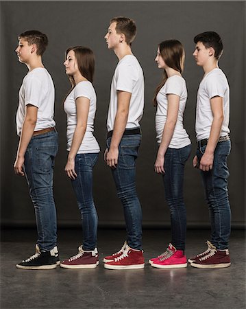 simsearch:649-06844580,k - Profile of five teenagers standing in a group Stock Photo - Premium Royalty-Free, Code: 649-06844558