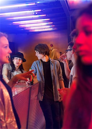 diverse teens partying - Group of people standing in bar Stock Photo - Premium Royalty-Free, Code: 649-06844720