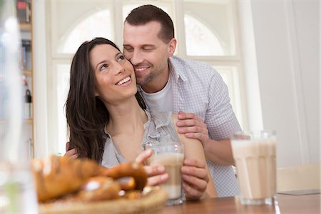 romance relationship home - Mid adult couple having breakfast Stock Photo - Premium Royalty-Free, Code: 649-06844836