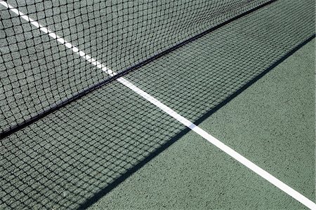 quadra (esportes) - Tennis net on court at day time Foto de stock - Royalty Free Premium, Número: 649-06844891