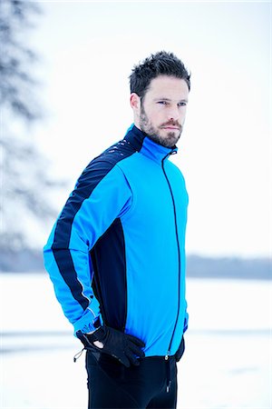 Side view of man in snow field Stock Photo - Premium Royalty-Free, Code: 649-06844990