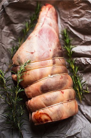 food close ups roast - Uncooked leg of lamb with rosemary Stock Photo - Premium Royalty-Free, Code: 649-06845215