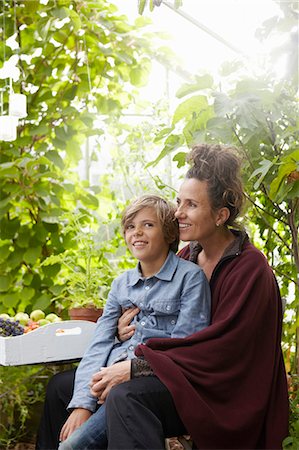simsearch:649-06943779,k - Mother and son sitting outdoors Stock Photo - Premium Royalty-Free, Code: 649-06943769