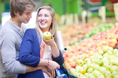 simsearch:649-08118535,k - Young couple buying fruit in indoor market Stock Photo - Premium Royalty-Free, Code: 649-07064038