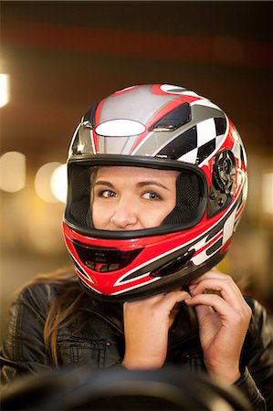 steering wheel - Close up of young woman on go cart Foto de stock - Sin royalties Premium, Código: 649-07064097