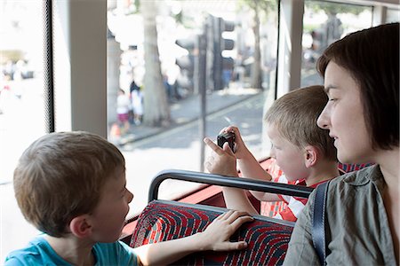 people window bus - Mother and sons on double decker bus in London Stock Photo - Premium Royalty-Free, Code: 649-07064447