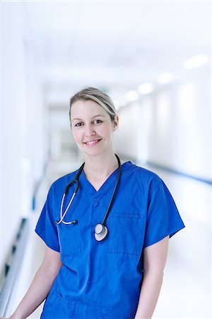 portrait of a woman and healthcare - Portrait of doctor with stethoscope around neck Stock Photo - Premium Royalty-Free, Code: 649-07064711