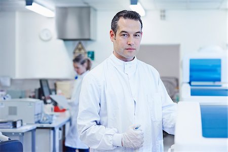 scientist looking at camera - Portrait of researcher in laboratory Stock Photo - Premium Royalty-Free, Code: 649-07064753