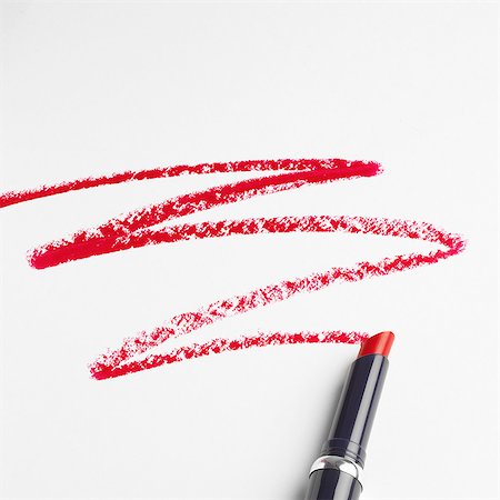 Lipstick zigzag pattern on white background Foto de stock - Sin royalties Premium, Código: 649-07065037