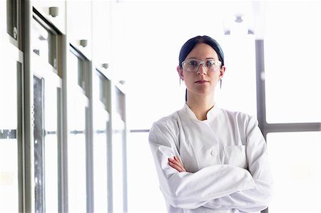 Portrait of female scientist wearing protective goggles Stock Photo - Premium Royalty-Free, Code: 649-07063490