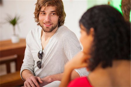 romantic couple cafe - Young couple talking in cafe Stock Photo - Premium Royalty-Free, Code: 649-07063524