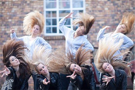 dancing with hair - Group of girls practicing dance in carpark Stock Photo - Premium Royalty-Free, Code: 649-07063844