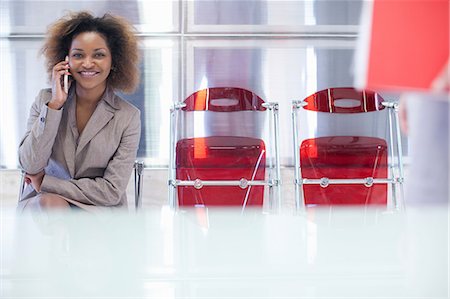 Young woman waiting in office Foto de stock - Sin royalties Premium, Código: 649-07063919