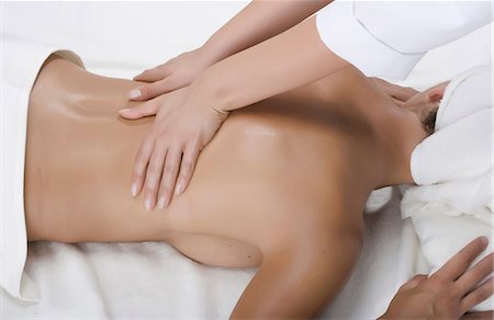 simsearch:649-08144531,k - Person massaging woman's back Stock Photo - Premium Royalty-Free, Code: 649-07118669