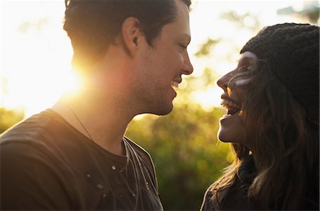 portraits fall - Portrait of couple in autumn sunlight laughing Stock Photo - Premium Royalty-Free, Code: 649-07118787