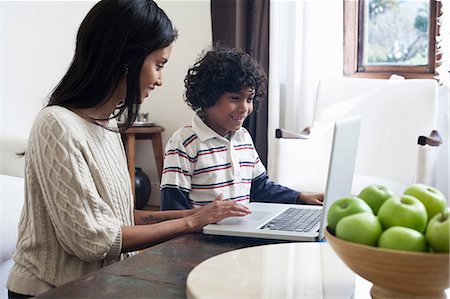 Mother and son using laptop Stock Photo - Premium Royalty-Free, Code: 649-07118928