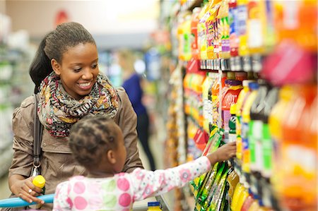 supermarket family - Female shopper and daughter in supermarket Stock Photo - Premium Royalty-Free, Code: 649-07119188