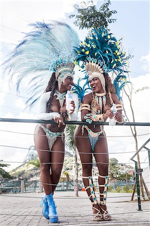 elaborate - Samba dancers leaning on railing, Rio De Janeiro, Brazil Stock Photo - Premium Royalty-Free, Code: 649-07119528